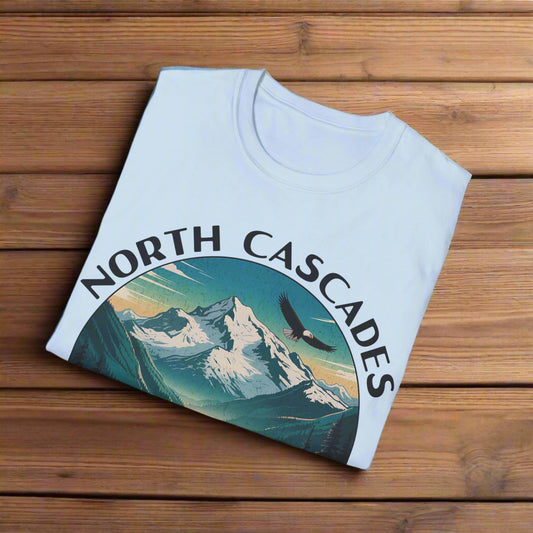 Light blue t-shirt with 'North Cascades' graphic design on a white background