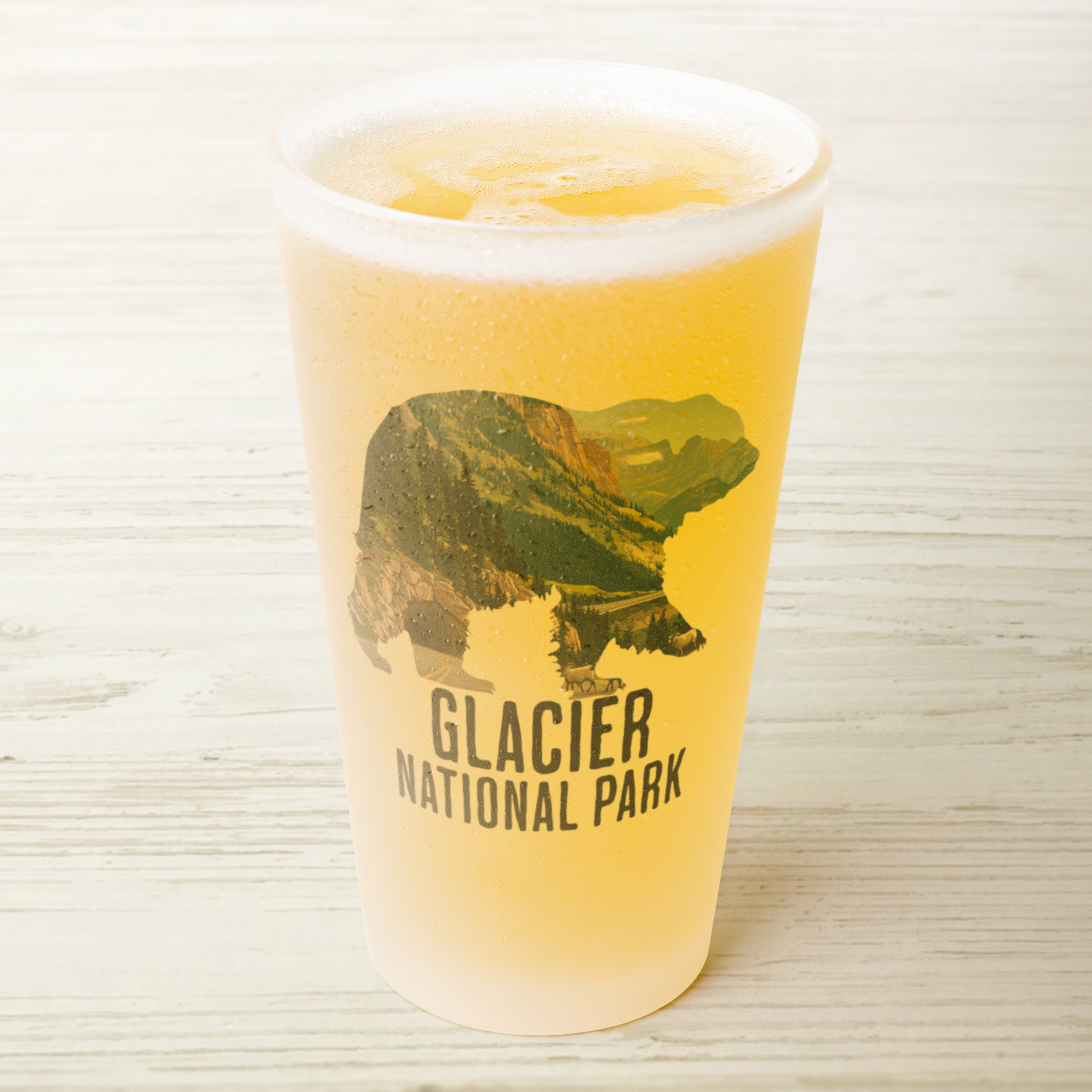 Glacier_National_Park_Grizzly_Bear_Frost_Pint_Filled_Mockup.png